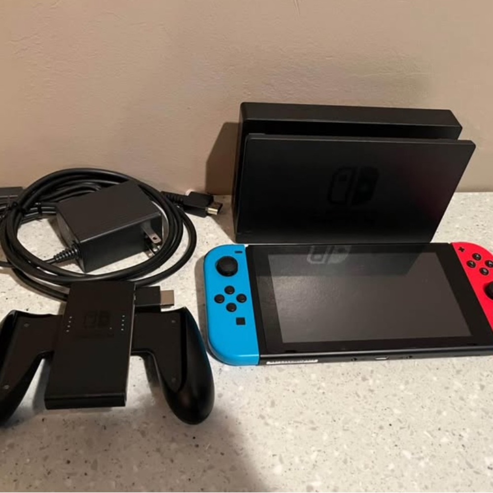Nintendo Switch Console with Red and Blue Joy-Con